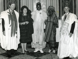 Commonwealth Secretary-General & Mrs Arnold Smith and the Rt Hon Malcolm MacDonald wearing Nigerian robes presented to them on behalf of the organisation of Nigerian indigenous businessmen by the Chairman Alhaji Garba Nautan Hamza and His wife. Credit: Commonwealth Secretariat ref ar073
